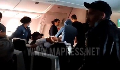 Passenger onboard Qatar Airways flight from Doha to Casablanca tried to open plane door and jump